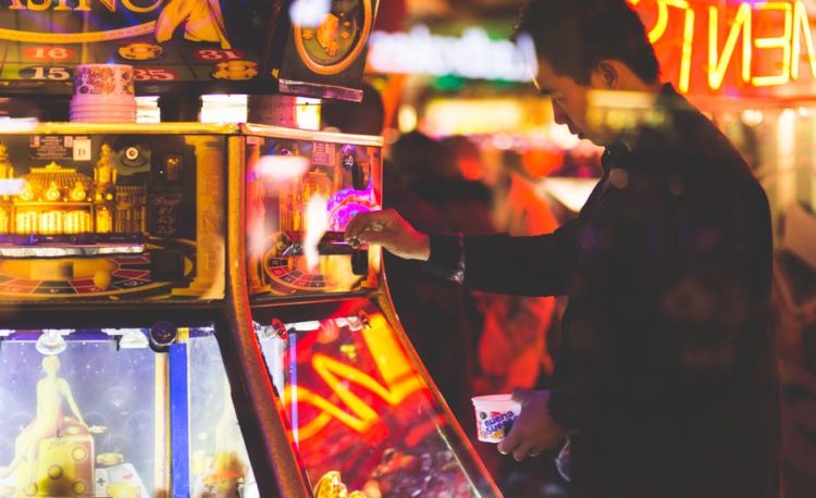 A man playing a slot game