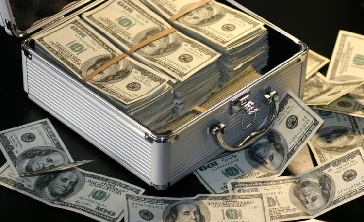 A 100 dollar bill inside an attache case